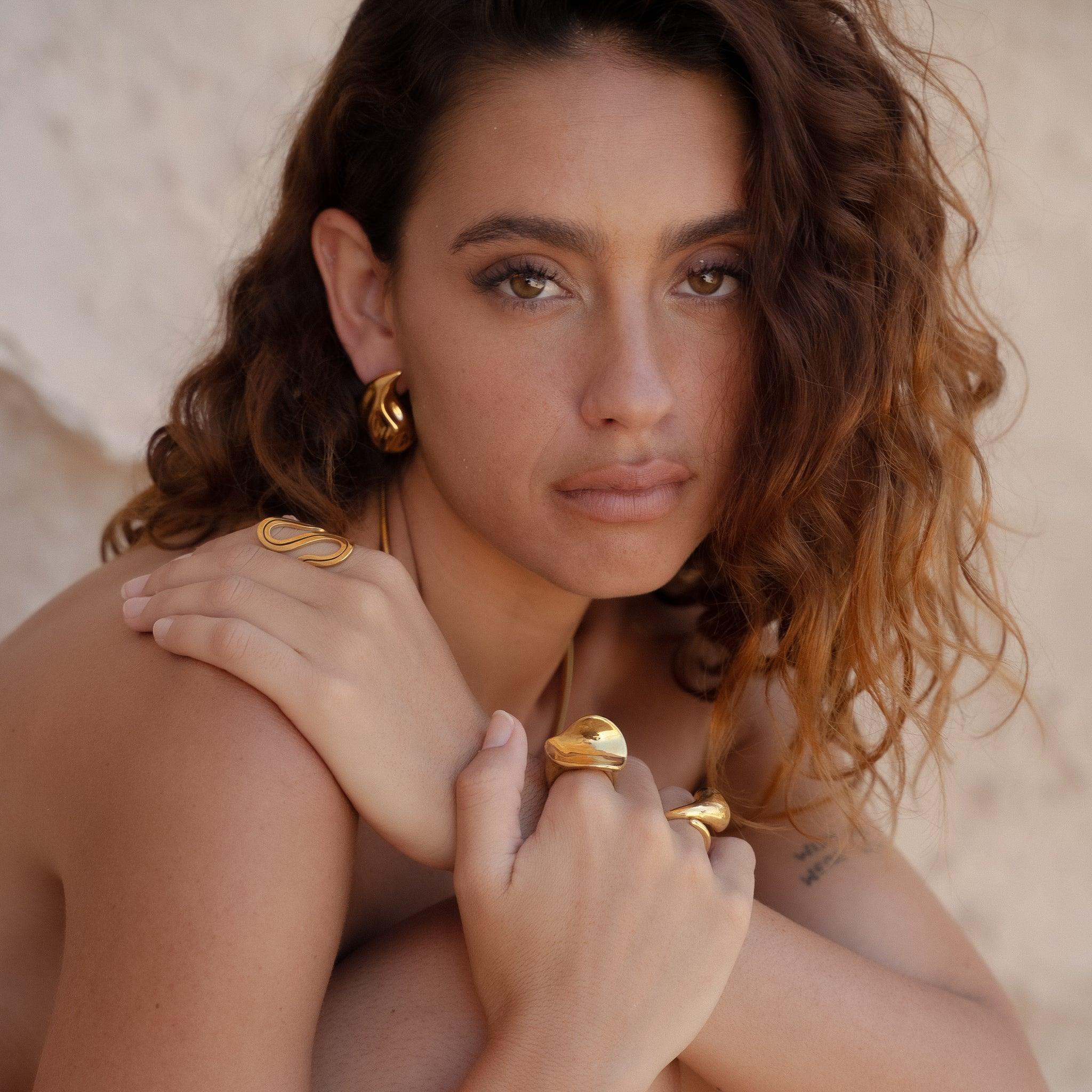 Brincos Celine Gota Polida